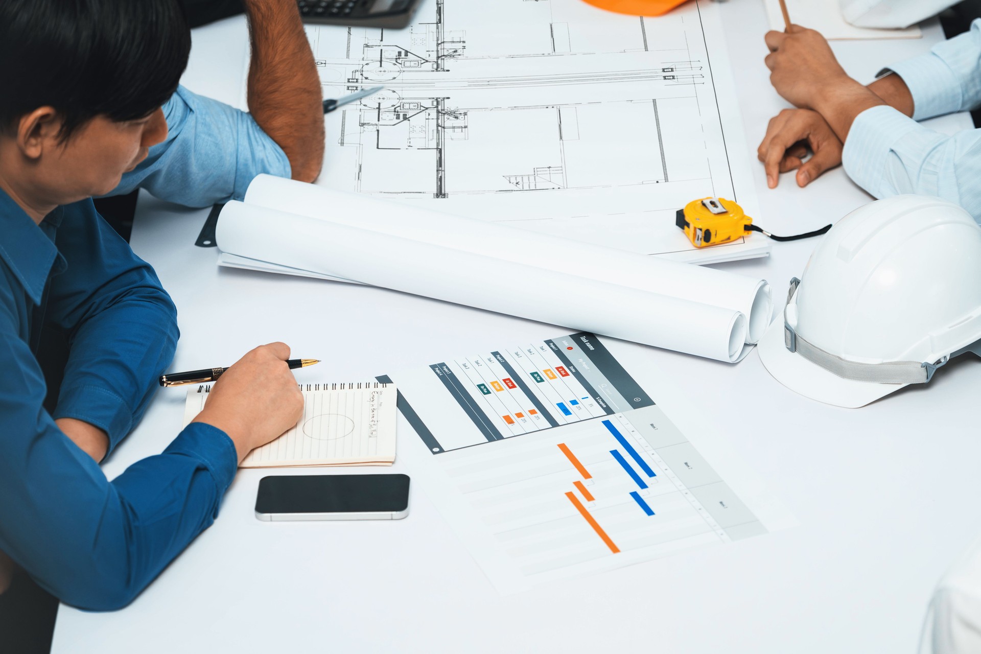 Diverse group of civil engineer and client working on architect. Prudent